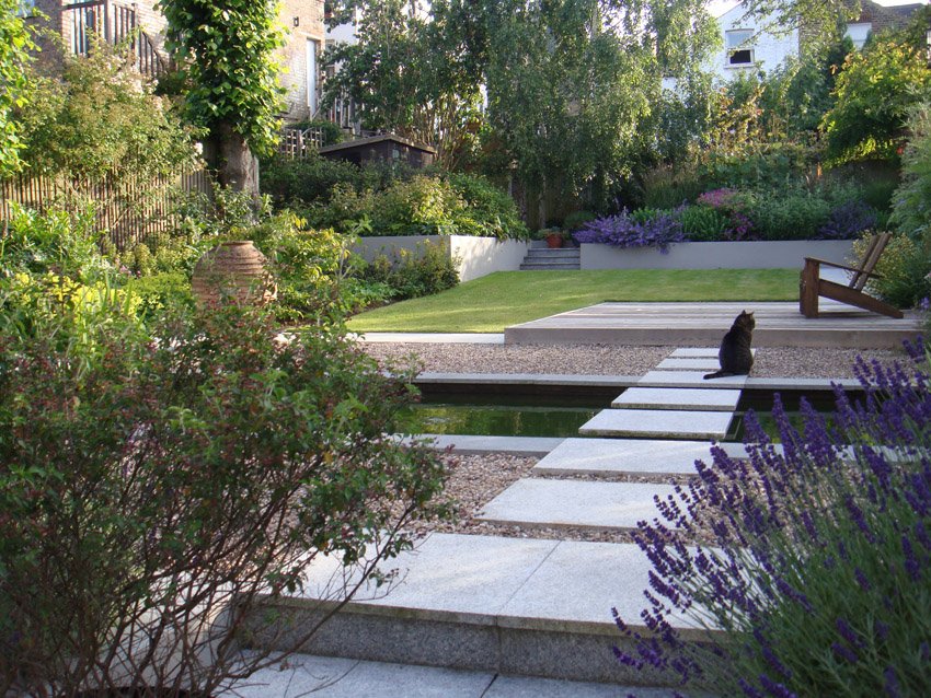 Stepping stones across pool to cedar deck