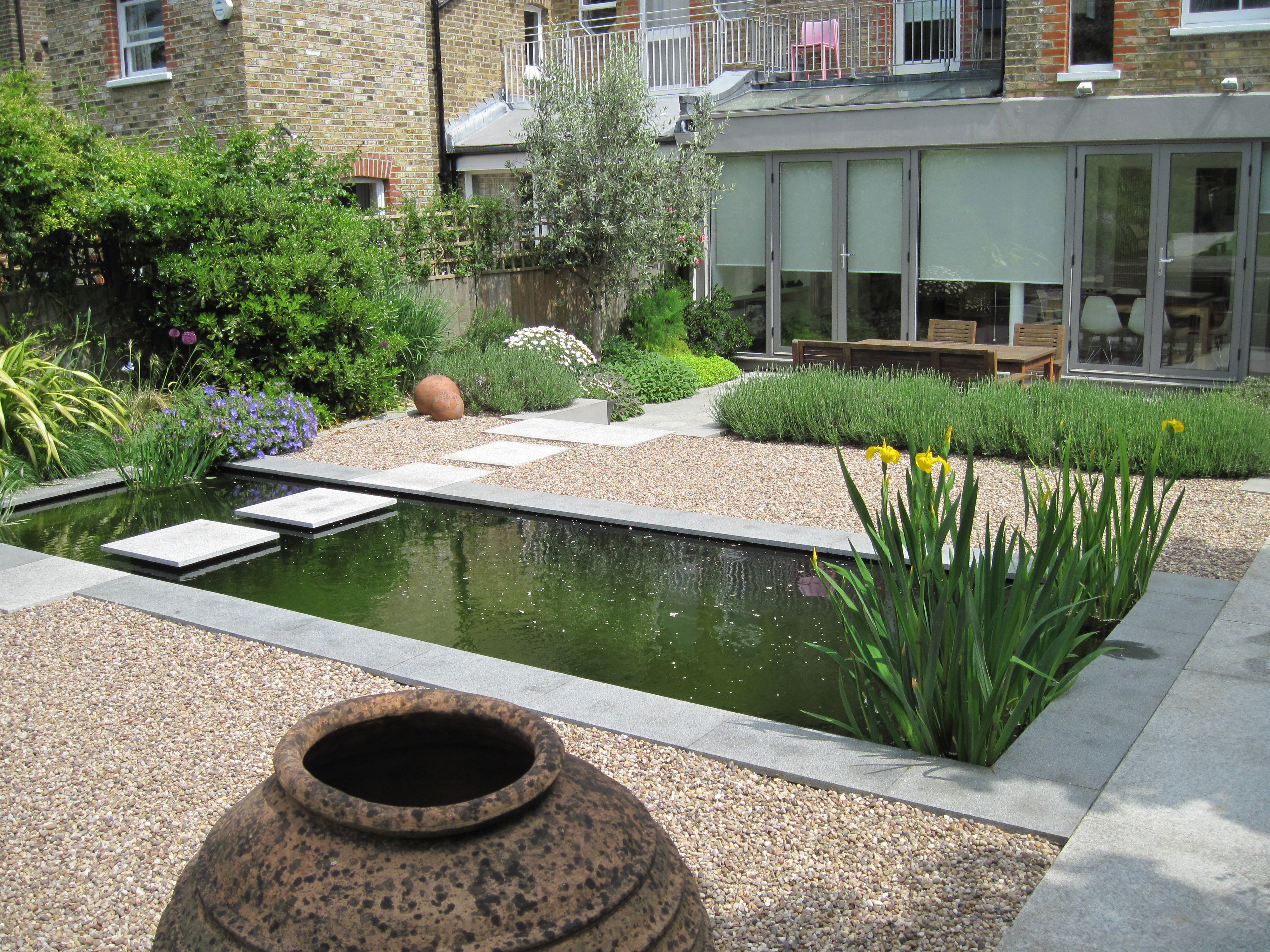 Formal pond with 'floating' stepping stones