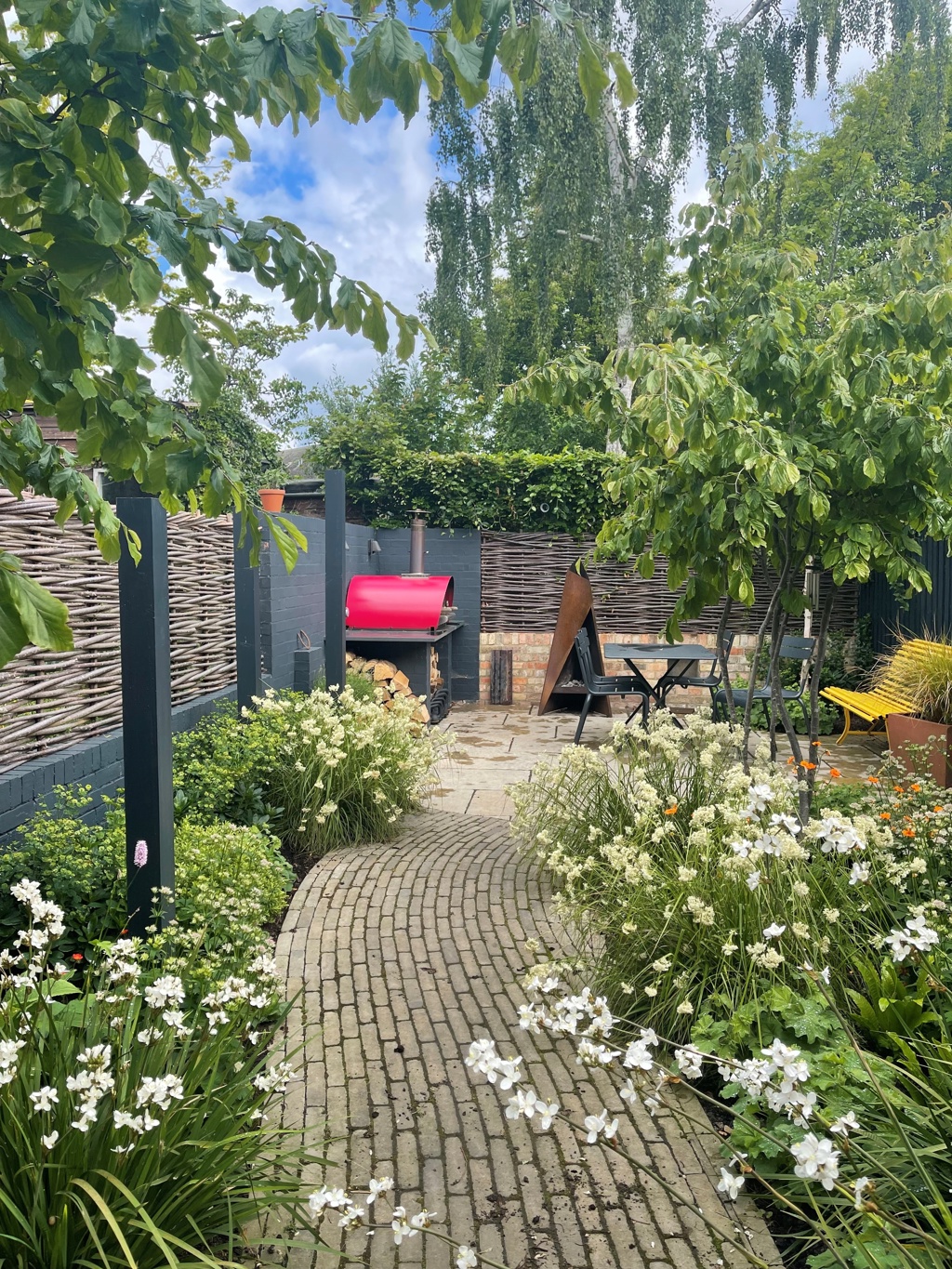 Curved clay paver path