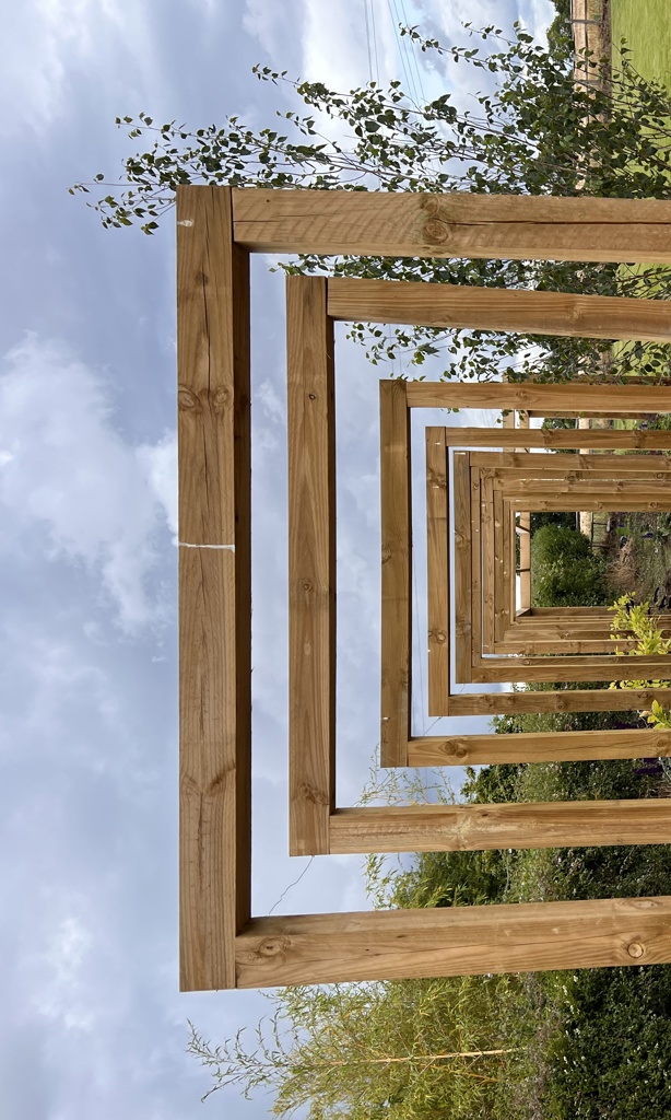 Archway leading to pergola