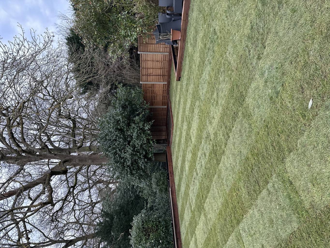 Lawn area levelled by 30 ton top soil.