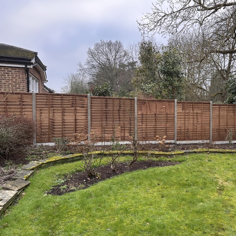 Overlap fencing Installation, side elevation, concrete posts and kickboards boards boards, overlap panelling.