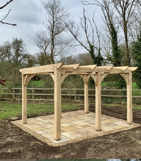 oak pergola and sandstone patio 