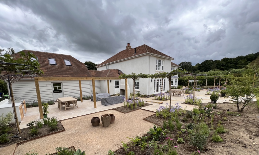 Gravel terraces creating breaks in levels and materials