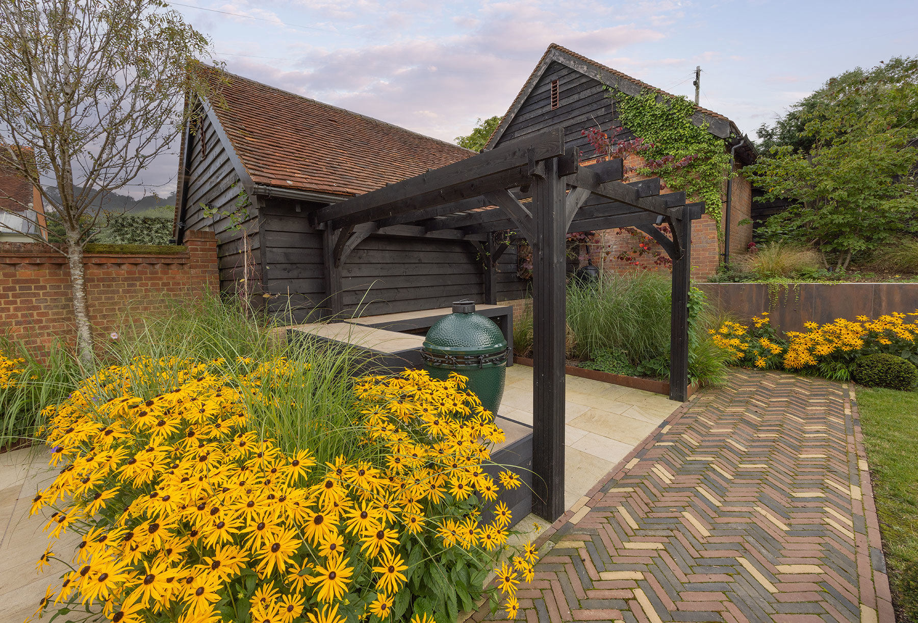Outdoor kitchen under a pergola