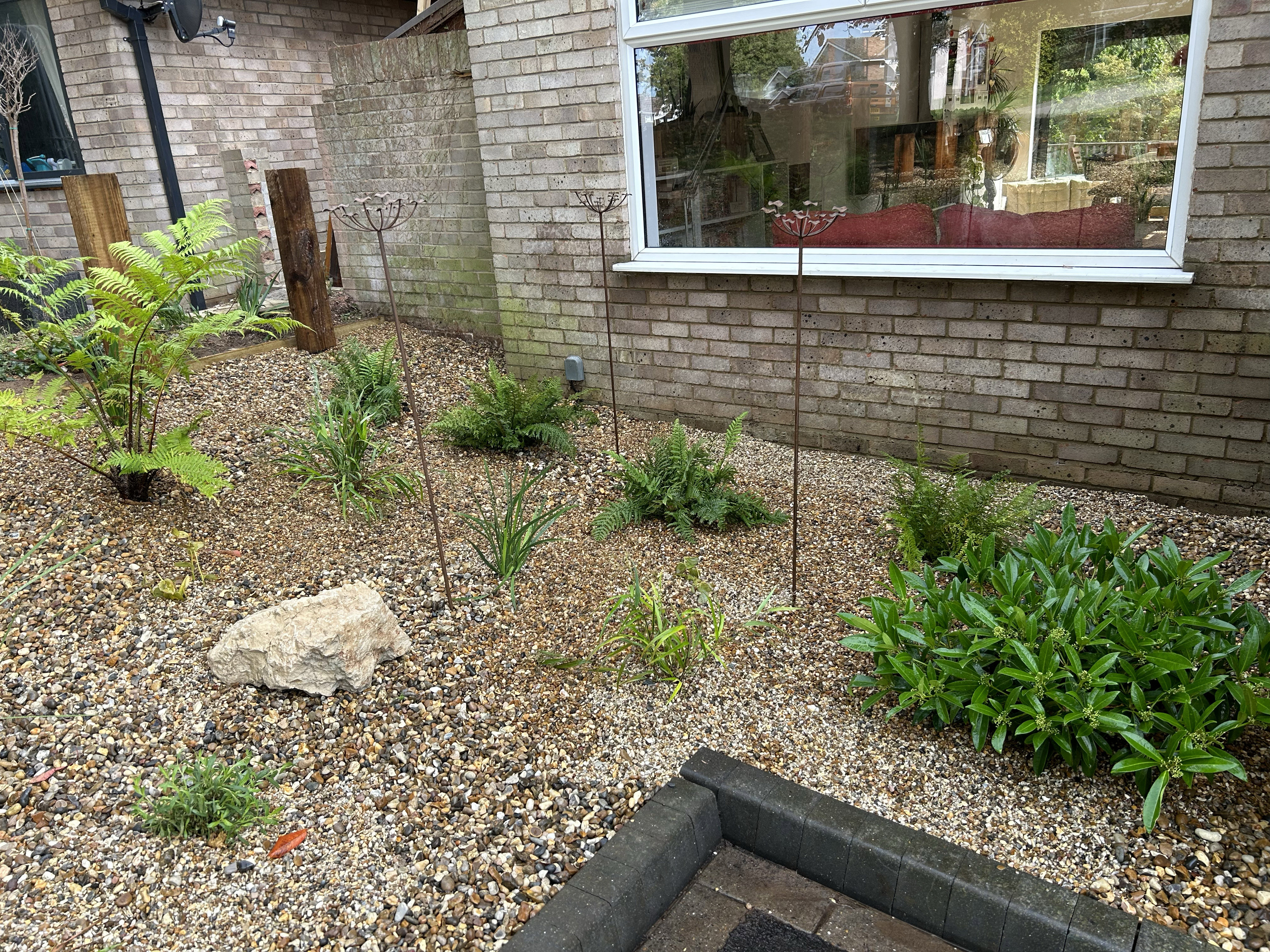 Garden art and ferns