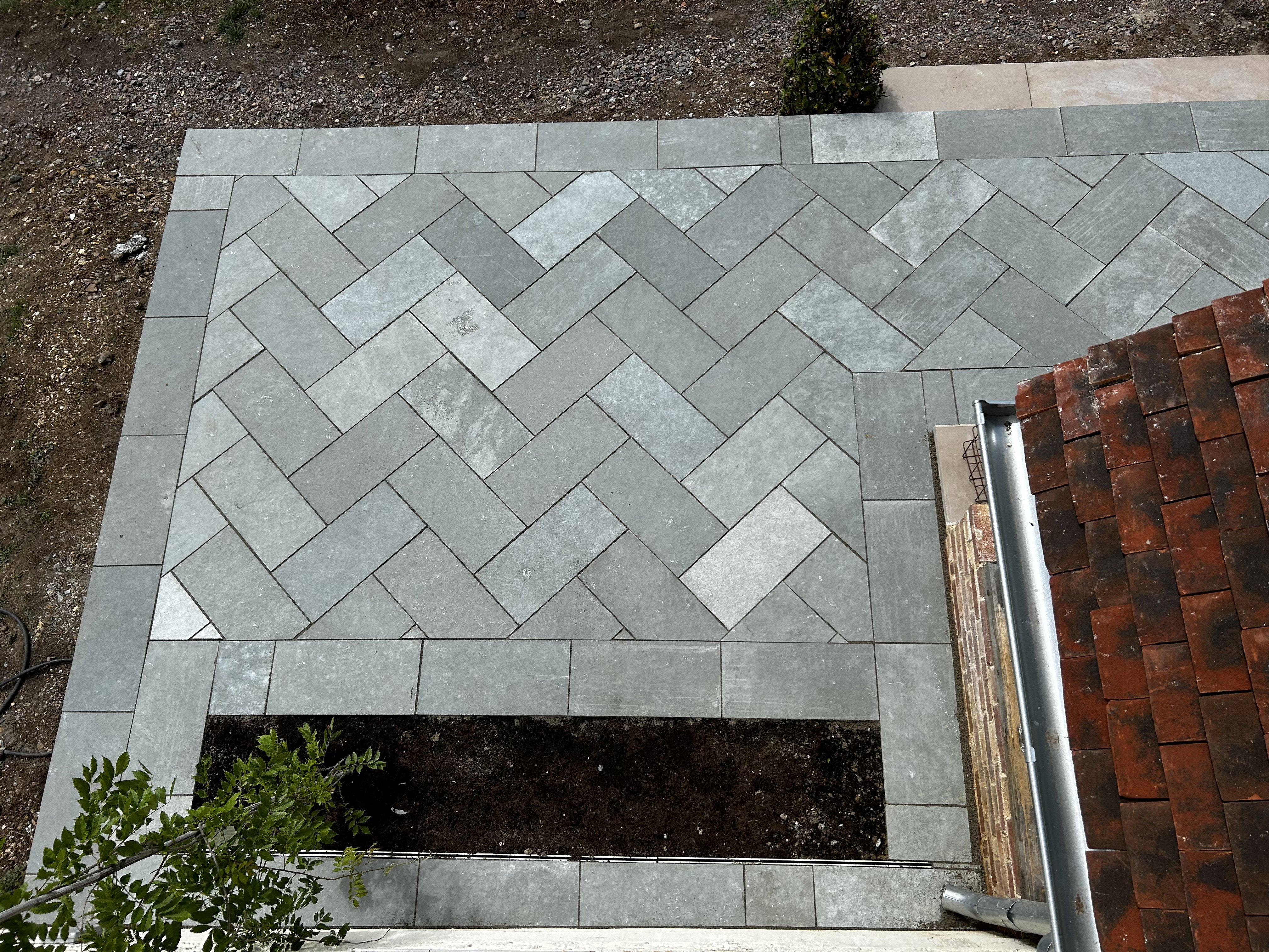 Herringbone limestone patio