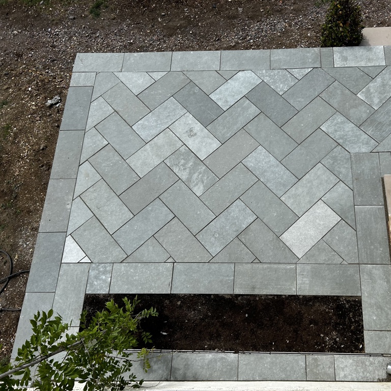 Herringbone limestone patio